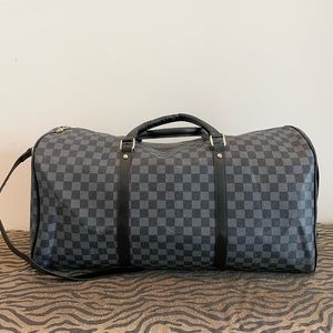 Checkered luggage bag
